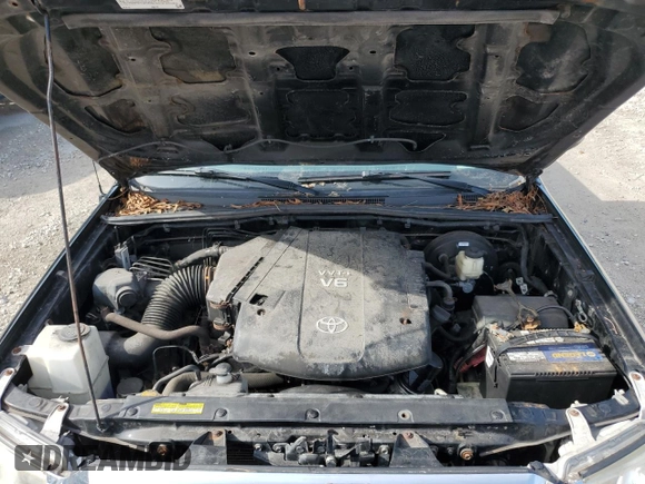 2015 Toyota Tacoma с VIN 3TMMU4FN6FM073394, выставлен на аукционе Copart как лот 64592495 с пробегом 156 753 миль миль и Списание • Salvage title. История ставок и продаж доступна на DreamBid. Изображение 11.