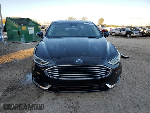 2019 Ford Fusion Hybrid SEL with VIN 3FA6P0MU7KR260813, listed as a Copart auction lot 73311492 with 70,783 mi miles. Bid and sale history available at carsss.com. Image 5.