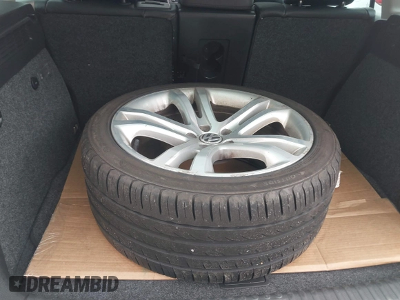 2012 Volkswagen Tiguan S with VIN WVGBV7AX0CW543697, listed as a IAAI auction lot 41853077 with 113,002 mi miles and . Bid and sale history available at DreamBid. Image 12.