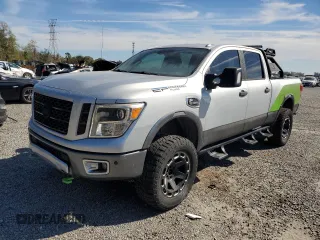 2017 Nissan Titan XD PRO-4X with VIN 1N6BA1F41HN551233, listed as a Copart auction lot 48311825 with 126,489 mi miles and Salvage Title. Bid and sale history available at carsss.com. Image 1.