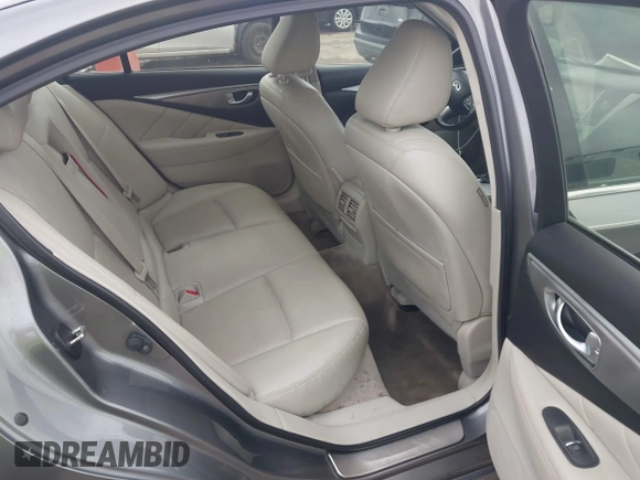 2015 Infiniti Q50 Premium z VIN JN1BV7AR9FM413801, wystawiony jako IAAI lot #42134770 z przebiegiem 111 367 mil mil oraz . Historia ofert i sprzedaży dostępna na DreamBid. Obrazek 8.