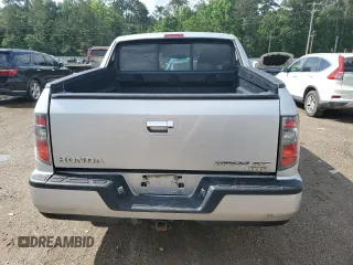 2014 Honda Ridgeline RTL with VIN 5FPYK1F58EB012869, listed as a Copart auction lot 51854995 with 318,950 mi miles and Salvage title. Bid and sale history available at DreamBid. Image 6.