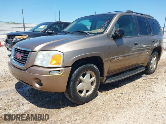 2003 GMC Envoy SLT with VIN 1GKDS13S432246741, listed as a IAAI auction lot 42051902 with 344,691 mi miles and . Bid and sale history available at DreamBid. Image 2.