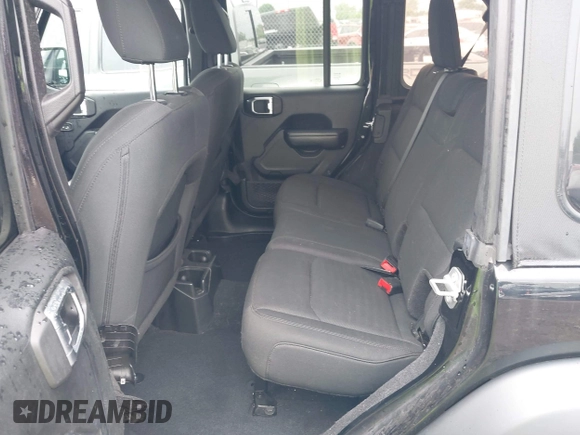 2018 Jeep Wrangler Unlimited Sport S with VIN 1C4HJXDG3JW150232, listed as a IAAI auction lot 42379385 with 60,679 mi miles and . Bid and sale history available at DreamBid. Image 8.