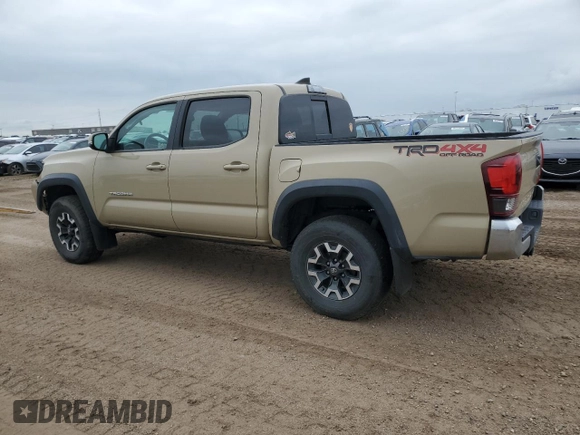 2018 Toyota Tacoma SR with VIN 3TMCZ5AN8JM145862, listed as a Copart auction lot 60190215 with 81,909 mi miles and Salvage title. Bid and sale history available at DreamBid. Image 2.