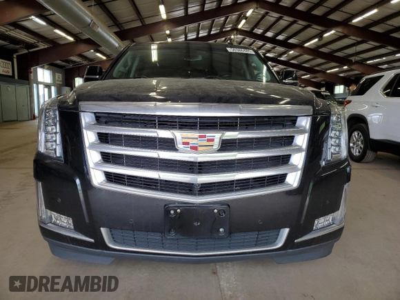 2020 Cadillac Escalade ESV Luxury z VIN 1GYS4HKJXLR150354, wystawiony jako Copart lot #56386485 z przebiegiem 131 803 mil mil oraz Szkoda całkowita • Salvage title. Historia ofert i sprzedaży dostępna na DreamBid. Obrazek 5.