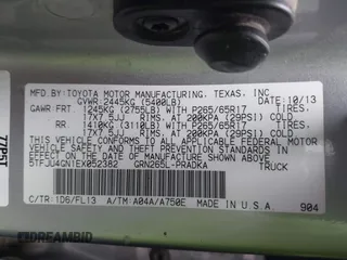 2014 Toyota Tacoma PreRunner with VIN 5TFJU4GN1EX052382, listed as a IAAI auction lot 41533721 with 165,245 mi miles. Bid and sale history available at carsss.com. Image 9.