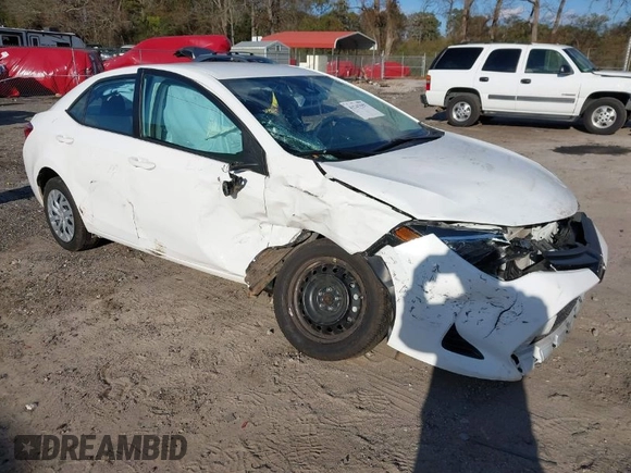 2019 Toyota Corolla L with VIN 5YFBURHEXKP934032, listed as a IAAI auction lot 41247557 with 95,560 mi miles. Bid and sale history available at carsss.com. Image 1.