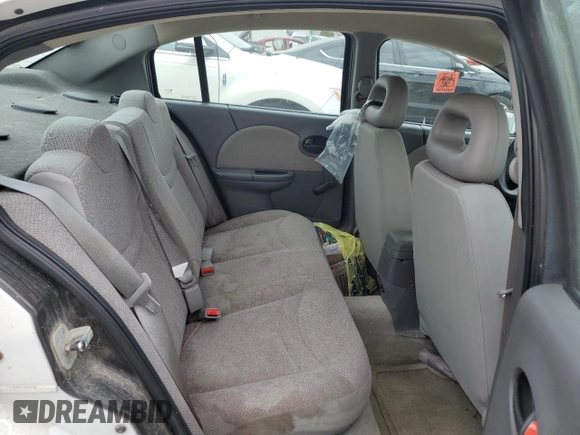 2004 Saturn ION ION 1 z VIN 1G8AG52F44Z141809, wystawiony jako Copart lot #53102065 z przebiegiem 162 821 mil mil oraz Nie do naprawy • Non repairable. Historia ofert i sprzedaży dostępna na DreamBid. Obrazek 10.