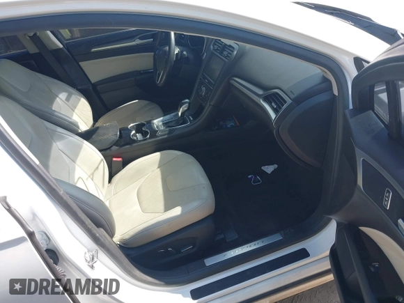2015 Ford Fusion Titanium with VIN 3FA6P0K90FR282320, listed as a IAAI auction lot 41777384 with 154,204 mi miles. Bid and sale history available at carsss.com. Image 5.