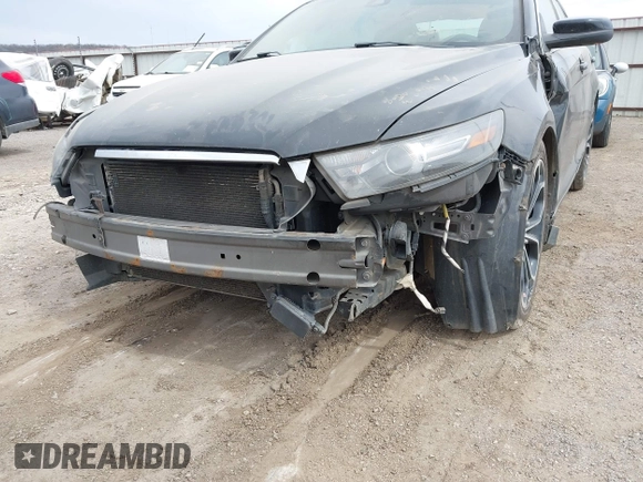 2013 Ford Taurus SHO z VIN 1FAHP2KT6DG174191, wystawiony jako IAAI lot #41752293 z przebiegiem 147 607 mil mil oraz . Historia ofert i sprzedaży dostępna na DreamBid. Obrazek 6.
