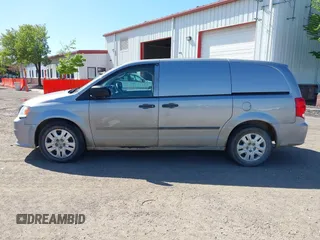 2014 Ram Cargo Van with VIN 2C4RRGAG9ER312915, listed as a IAAI auction lot 41947886 with 149,144 mi miles and . Bid and sale history available at DreamBid. Image 14.