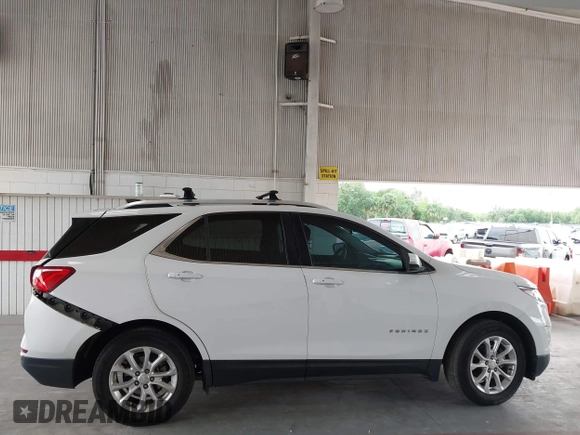2018 Chevrolet Equinox LT z VIN 3GNAXJEV2JL285919, wystawiony jako IAAI lot #42417524 z przebiegiem 79 402 mil mil oraz . Historia ofert i sprzedaży dostępna na DreamBid. Obrazek 13.