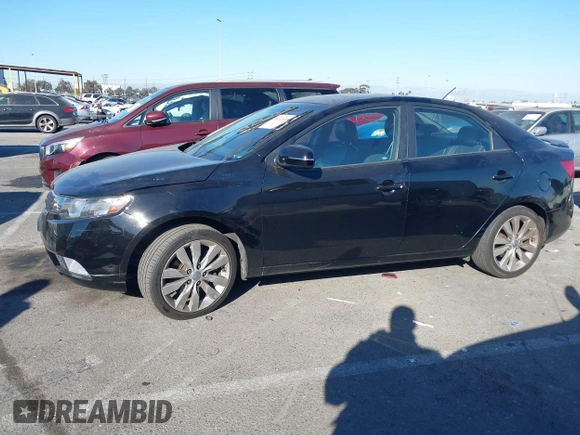 2012 Kia Forte SX with VIN KNAFW4A32C5623357, listed as a IAAI auction lot 41324098 with 217,354 mi miles. Bid and sale history available at carsss.com. Image 13.