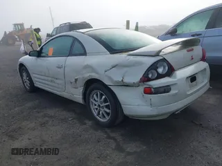 2001 Mitsubishi Eclipse GS with VIN 4A3AC44G21E214287, listed as a IAAI auction lot 41004057 with 99,465 mi miles and . Bid and sale history available at carsss.com. Image 3.