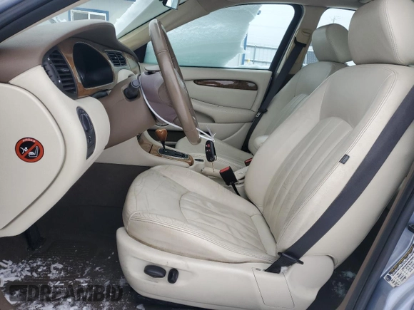 2007 Jaguar X-Type z VIN SAJWA51A27WJ21259, wystawiony jako Copart lot #42643115 z przebiegiem 106 800 mil mil oraz Szkody całkowita. Historia ofert i sprzedaży dostępna na DreamBid. Obrazek 7.