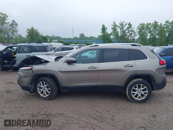 2017 Jeep Cherokee Latitude with VIN 1C4PJMCB3HW657318, listed as a IAAI auction lot 42429044 with 133,335 mi miles and . Bid and sale history available at DreamBid. Image 14.