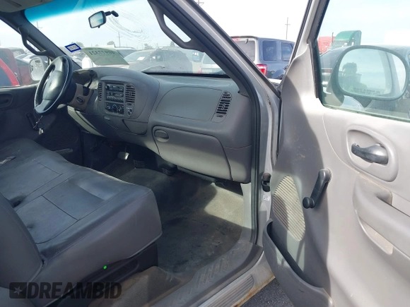 2002 Ford F-150 XL with VIN 3FTRF17212MA13777, listed as a IAAI auction lot 40977321 with 1 mi miles. Bid and sale history available at carsss.com. Image 5.