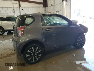 2012 Scion iQ with VIN JTNJJXB07CJ018013, listed as a Copart auction lot 57101085 with 91,370 mi miles and Non repairable. Bid and sale history available at DreamBid. Image 3.