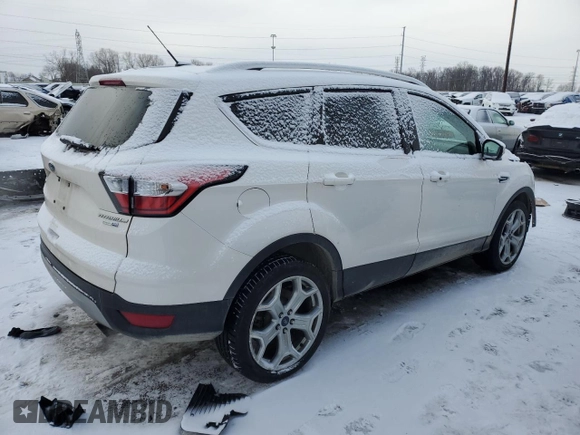 2017 Ford Escape Titanium with VIN 1FMCU9JD0HUE33552, listed as a Copart auction lot 45757535 with 59,628 mi miles and Clean Title. Bid and sale history available at carsss.com. Image 3.
