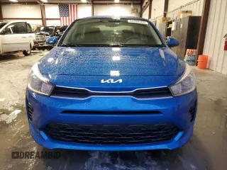 2022 Kia Rio LX with VIN 3KPA24AD3NE497373, listed as a Copart auction lot 84286184 with 27,628 mi miles and Salvage Title. Bid and sale history available at carsss.com. Image 5.