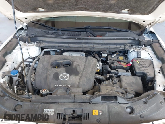 2020 Mazda CX-5 Grand Touring with VIN JM3KFBDM2L0863944, listed as a IAAI auction lot 42150805 with 63,932 mi miles and . Bid and sale history available at DreamBid. Image 10.