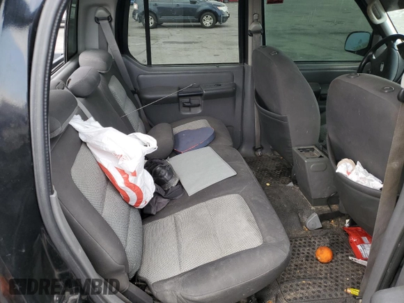 2005 Ford Explorer Sport Trac XLS z VIN 1FMZU67K15UB77562, wystawiony jako Copart lot #59619895 z przebiegiem 122 810 mil mil oraz Szkoda całkowita • Salvage title. Historia ofert i sprzedaży dostępna na DreamBid. Obrazek 10.