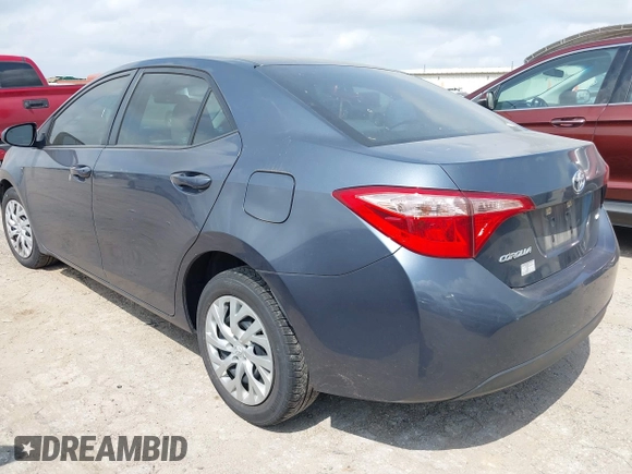 2019 Toyota Corolla L z VIN 5YFBURHE7KP948955, wystawiony jako IAAI lot #42046123 z przebiegiem 98 352 mil mil oraz . Historia ofert i sprzedaży dostępna na DreamBid. Obrazek 3.