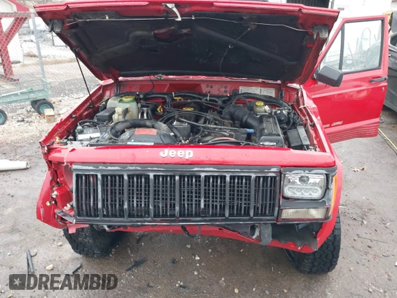 1996 Jeep Cherokee Sport with VIN 1J4FJ68S6TL299152, listed as a IAAI auction lot 41004736 with 277,819 mi miles. Bid and sale history available at carsss.com. Image 10.