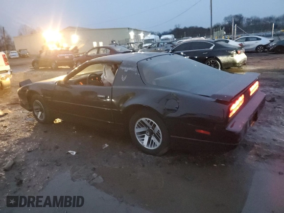 1990 Pontiac Firebird with VIN 1G2FS23TXLL205077, listed as a Copart auction lot 44035705 with 142,809 mi miles and Salvage title. Bid and sale history available at DreamBid. Image 2.
