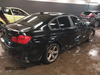 2013 BMW 3 Series 328i xDrive with VIN WBA3B3G53DNR80324, listed as a IAAI auction lot 41490385 with 177,026 mi miles and . Bid and sale history available at carsss.com. Image 4.