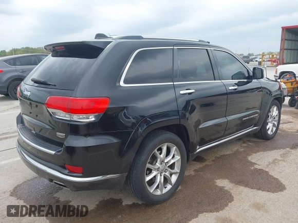 2015 Jeep Grand Cherokee Summit z VIN 1C4RJFJT0FC674494, wystawiony jako IAAI lot #42056835 z przebiegiem 143 969 mil mil oraz . Historia ofert i sprzedaży dostępna na DreamBid. Obrazek 4.