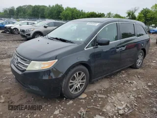 2013 Honda Odyssey EX z VIN 5FNRL5H45DB082074, wystawiony jako Copart lot #60303345 z przebiegiem 145 977 mil mil oraz Czysty tytuł • Clean title. Historia ofert i sprzedaży dostępna na DreamBid. Obrazek 1.