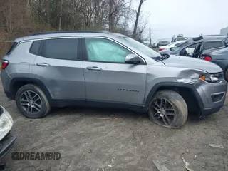 2018 Jeep Compass Altitude with VIN 3C4NJDBB1JT435428, listed as a IAAI auction lot 42050993 with 114,328 mi miles and . Bid and sale history available at DreamBid. Image 13.