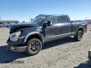 2017 Nissan Titan Pro-4X z VIN 1N6BA1F42HN530830, wystawiony jako Copart lot #63860384 z przebiegiem 317 812 mil mil oraz Szkody całkowita. Historia ofert i sprzedaży dostępna na DreamBid. Obrazek 1.