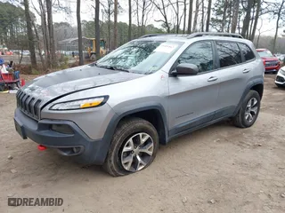 2017 Jeep Cherokee Trailhawk with VIN 1C4PJMBS9HW599524, listed as a IAAI auction lot 41420167 with 104,438 mi miles. Bid and sale history available at carsss.com. Image 17.