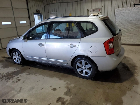2007 Kia Rondo EX with VIN KNAFG526677101045, listed as a Copart auction lot 82483754 with 152,572 mi miles and Salvage Title. Bid and sale history available at carsss.com. Image 2.
