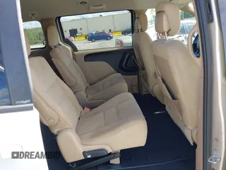 2014 Dodge Grand Caravan SXT with VIN 2C4RDGCGXER322705, listed as a IAAI auction lot 42170301 with 147,070 mi miles and . Bid and sale history available at DreamBid. Image 8.