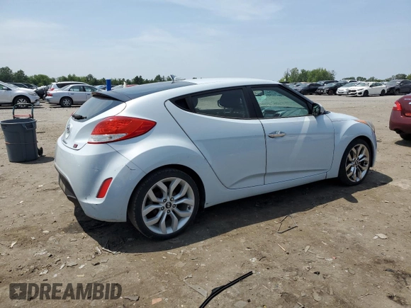 2015 Hyundai Veloster z VIN KMHTC6AD2FU221623, wystawiony jako Copart lot #58222615 z przebiegiem 176 801 mil mil oraz Czysty tytuł • Clean title. Historia ofert i sprzedaży dostępna na DreamBid. Obrazek 3.