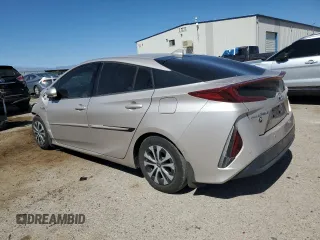 2020 Toyota Prius LE z VIN JTDKARFPXL3124035, wystawiony jako Copart lot #53996215 z przebiegiem Nie podano mil oraz Szkoda całkowita • Salvage title. Historia ofert i sprzedaży dostępna na DreamBid. Obrazek 2.