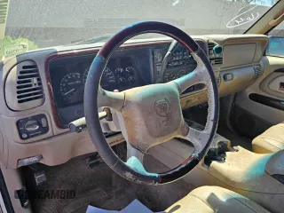 2000 Cadillac Escalade z VIN 1GYEK63R3YR218285, wystawiony jako Copart lot #82063084 z przebiegiem 190 444 mil mil oraz Tytuł czysty. Historia ofert i sprzedaży dostępna na DreamBid. Obrazek 9.
