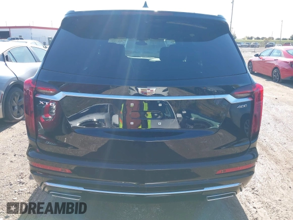 2025 Cadillac XT6 FWD Premium Luxury with VIN 1GYKPCRS1SZ118772, listed as a IAAI auction lot 41048190 with 131 mi miles. Bid and sale history available at carsss.com. Image 16.