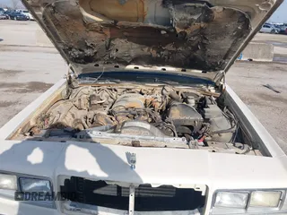 1991 Mercury Grand Marquis z VIN 2MECM75F7MX637786, wystawiony jako IAAI lot #41429297 z przebiegiem 12 512 mil mil oraz . Historia ofert i sprzedaży dostępna na DreamBid. Obrazek 10.