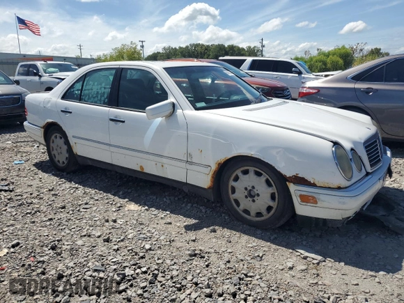 1999 Mercedes-Benz E-Class with VIN WDBJF65H0XA877630, listed as a Copart auction lot 69697454 with 0 mi miles and Salvage Title. Bid and sale history available at carsss.com. Image 4.