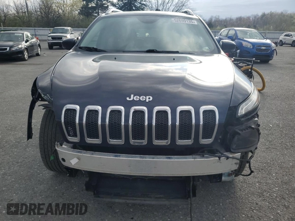2016 Jeep Cherokee Limited with VIN 1C4PJMDB3GW261581, listed as a Copart auction lot 52699135 with 162,510 mi miles and Salvage Title. Bid and sale history available at DreamBid. Image 5.