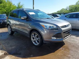 2013 Ford Escape Titanium z VIN 1FMCU0J95DUB46340, wystawiony jako IAAI lot #42168222 z przebiegiem 108 268 mil mil oraz . Historia ofert i sprzedaży dostępna na DreamBid. Obrazek 1.