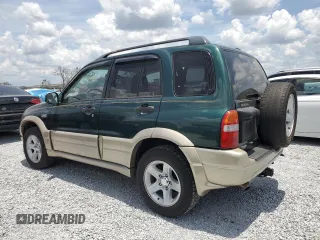 2002 Suzuki Grand Vitara JS z VIN JS3TE62V924151538, wystawiony jako Copart lot #58900085 z przebiegiem 130 514 mil mil oraz Szkoda całkowita • Salvage title. Historia ofert i sprzedaży dostępna na DreamBid. Obrazek 2.