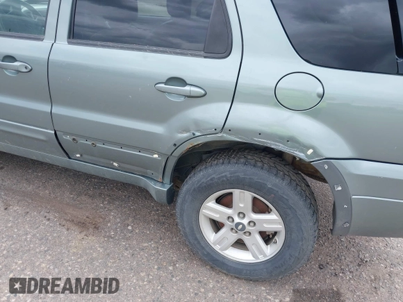 2006 Ford Escape Hybrid with VIN 1FMCU96H16KC81995, listed as a IAAI auction lot 42220504 with 207,388 mi miles and . Bid and sale history available at DreamBid. Image 6.