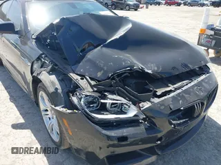 2014 BMW 6 Series 650i with VIN WBA6B2C58ED129026, listed as a IAAI auction lot 41825916 with 109,264 mi miles and . Bid and sale history available at carsss.com. Image 6.