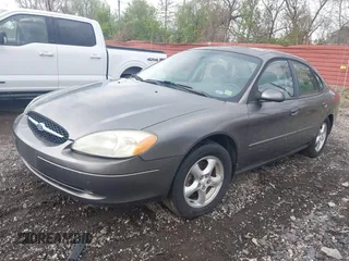 2002 Ford Taurus SE Standard with VIN 1FAFP53U42A109002, listed as a IAAI auction lot 42153281 with 156,115 mi miles and . Bid and sale history available at DreamBid. Image 2.